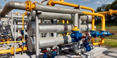 Gas industry, gas transport system. Gas pipeline. Gas pipes, stop valves and appliances for gas pumping station