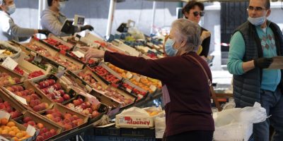 Consumers and sellers in the open-air market in Brussels, Belgium on May 18, 2020, amid the pandemic of the novel coronavirus (COVID-19).